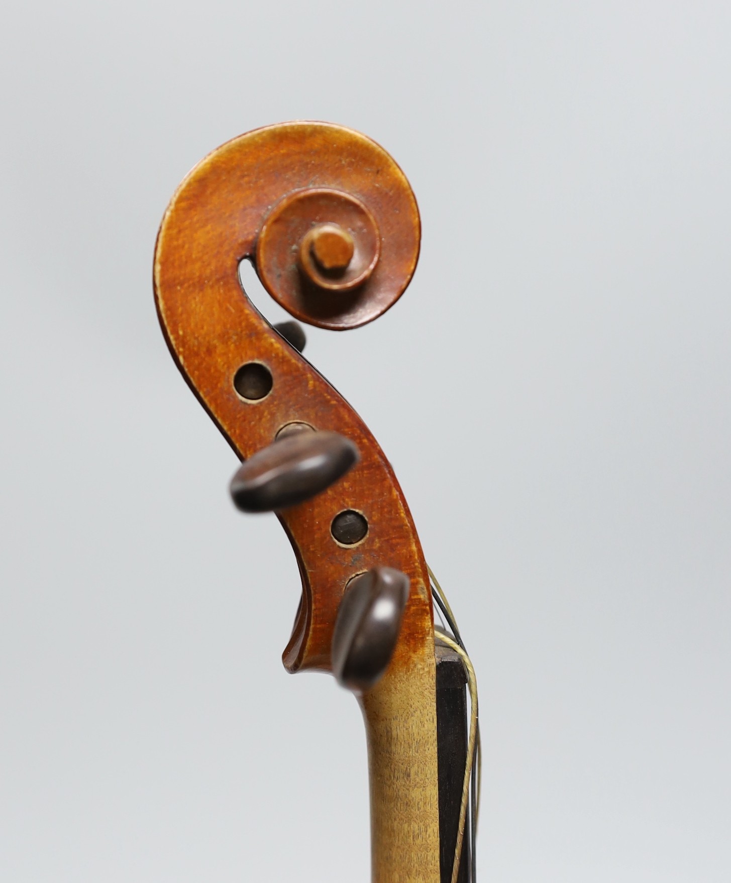 A cased 19th century French violin, back 34cm